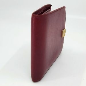 Dior Burgundy Wallet with Gold “CD” Accent. Good condition.